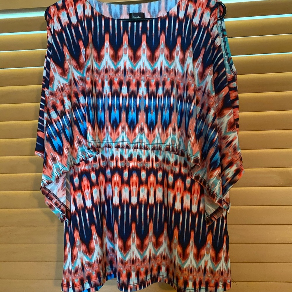 Multi colored top. 95% polyester and 5% spandex